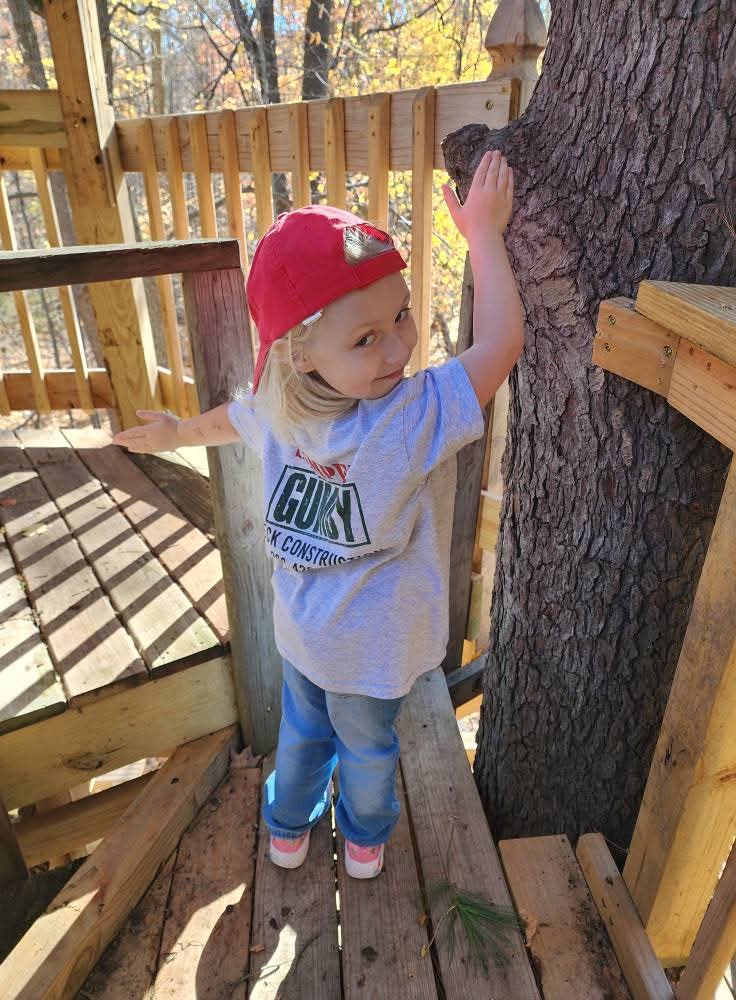 Princess Anastasia Gumby wearing a tiara and tutu at a job site