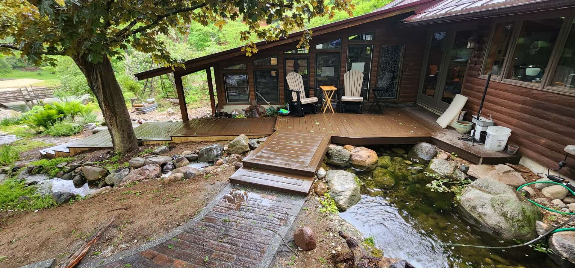 Slip-resistant composite deck surrounding a backyard pool